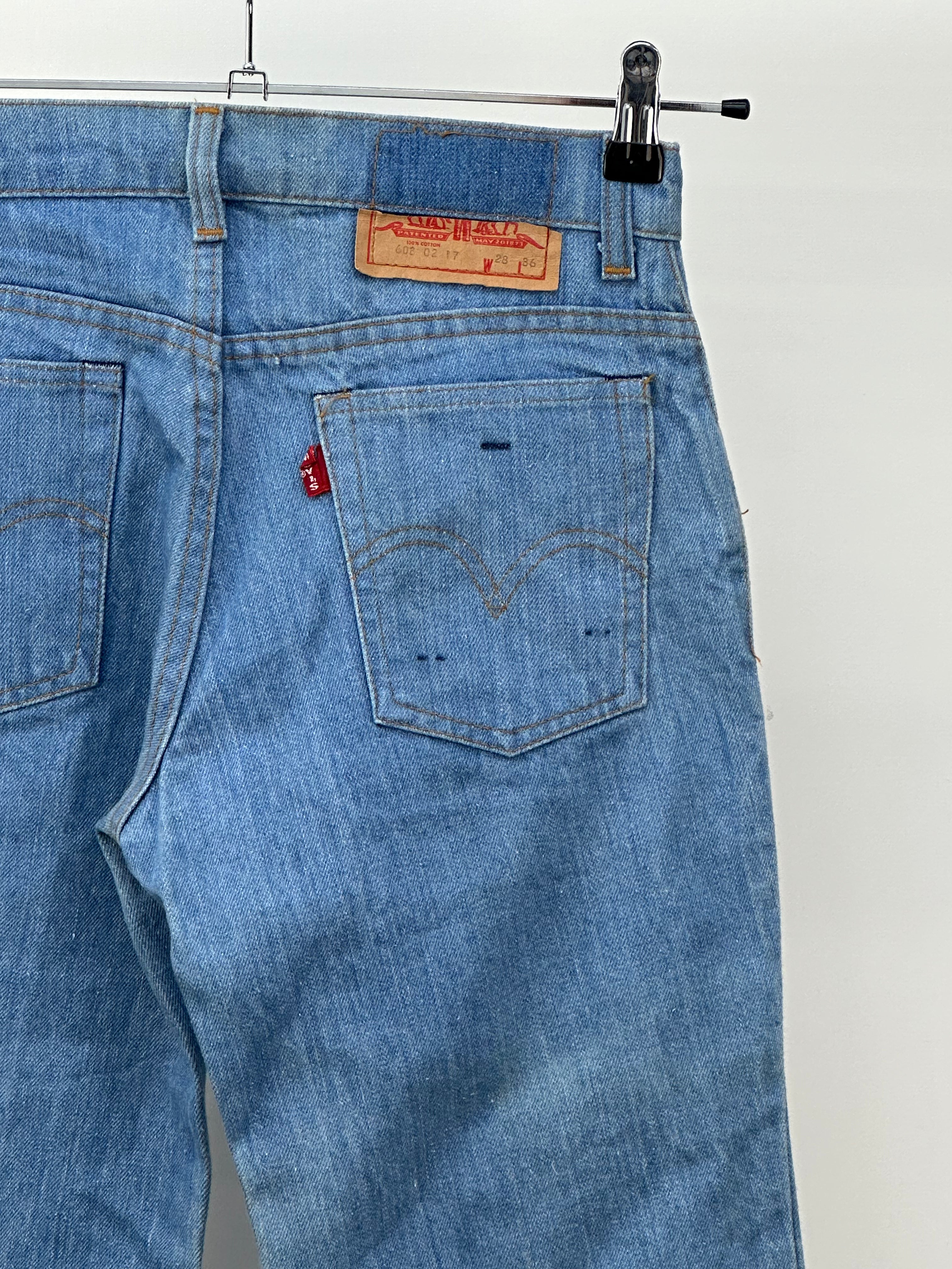 LEVI'S ZAMPA TAGLIA: 42 ITA = W28 L36